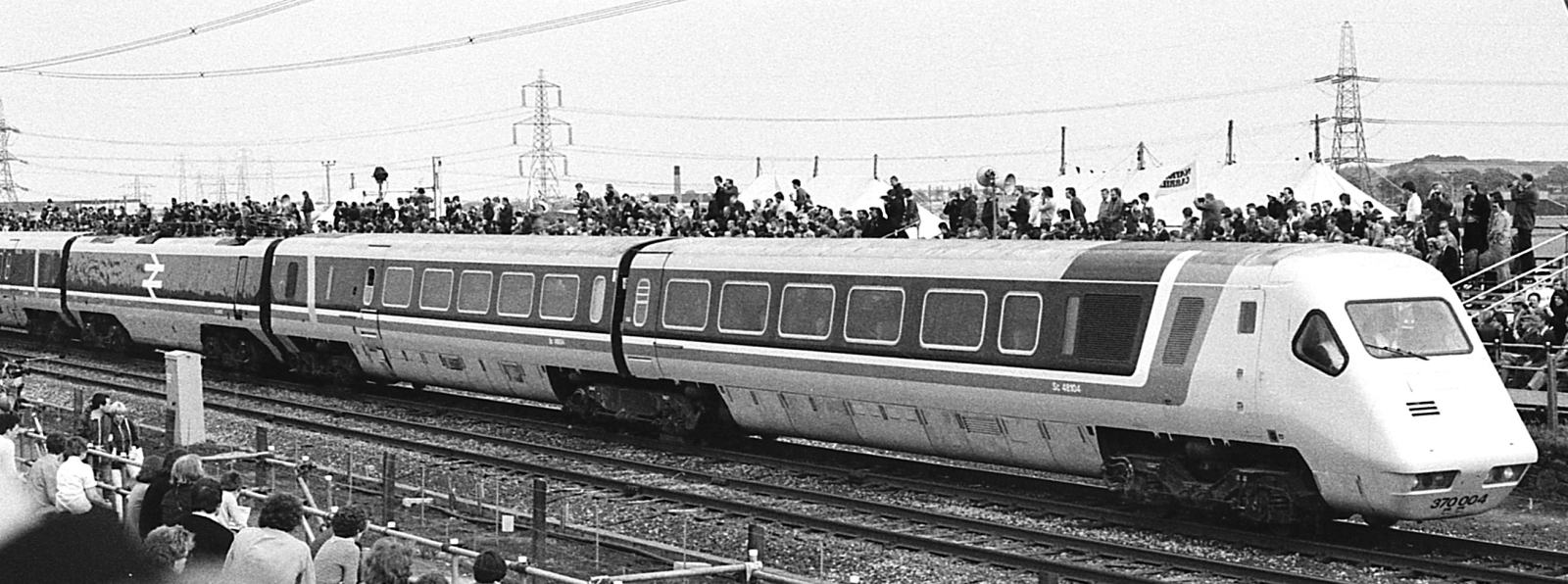 Shortened 370 004 with only one power car being pushed through crowds at Rainhill in May 1980
