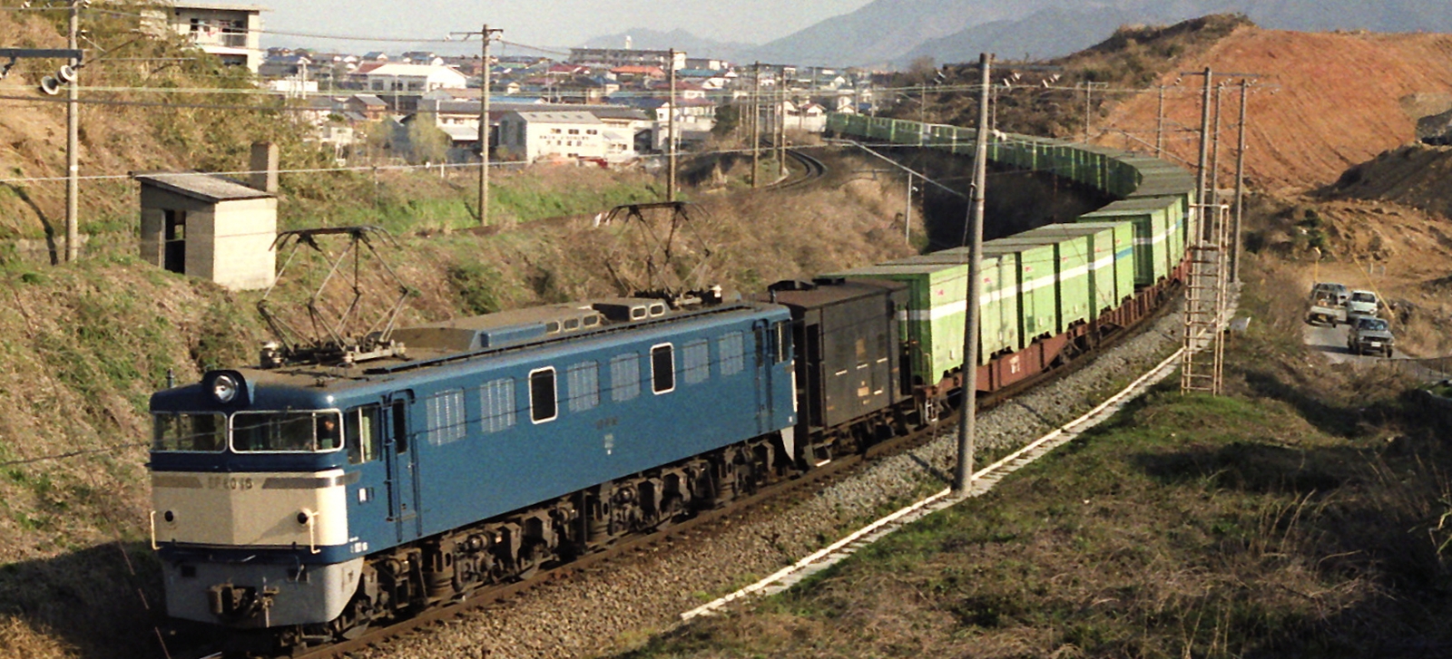 An EF60 in the year 1978 in front of a freight train