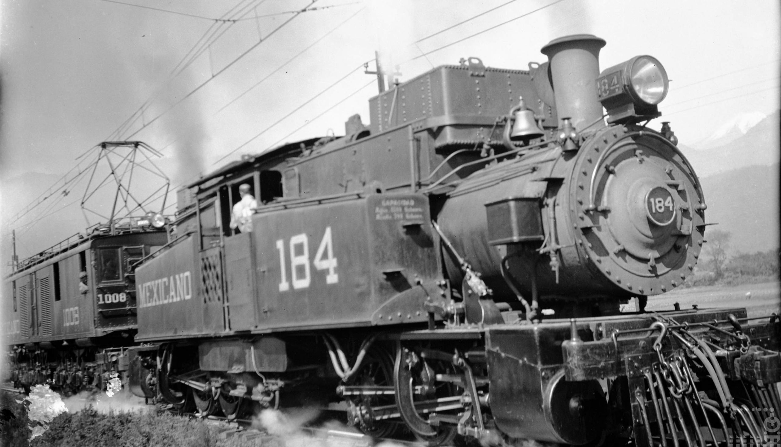 No. 184 assisting an electric locomotive