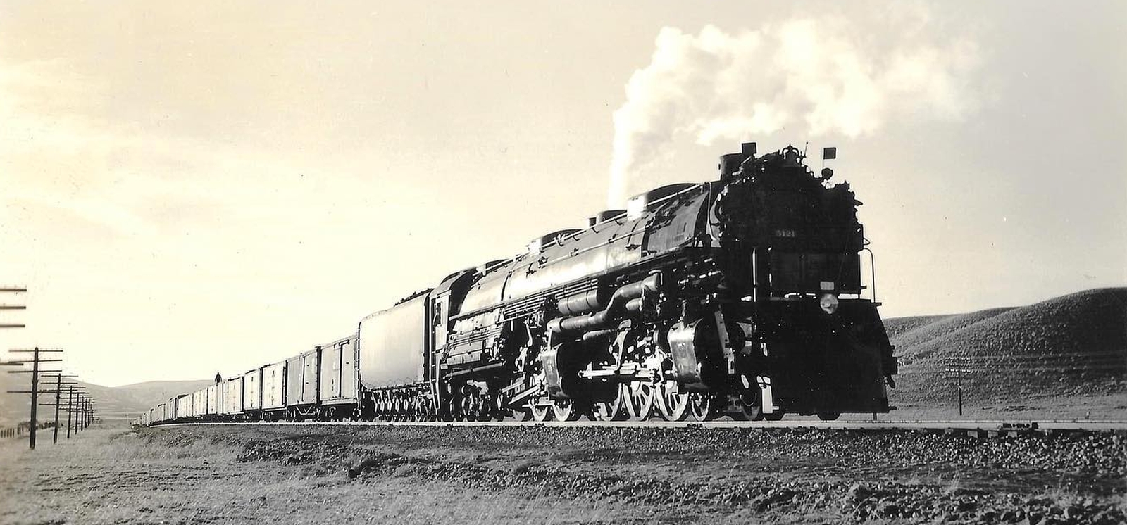 Z-7 No. 5121 waiting for it's clear signal with a long freight train in November 1941 somewhere in Montana