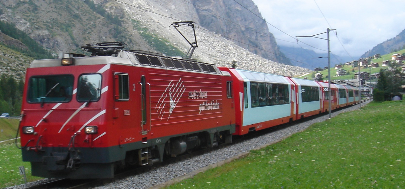 HGe 4/4 II of the Matterhorn-Gotthard-Bahn with a Glacier Express in August 2006 near Randa, Visp